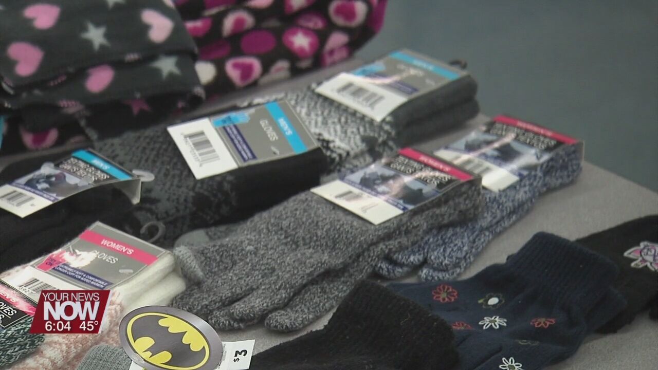 Students receive coats for school during Saturday event